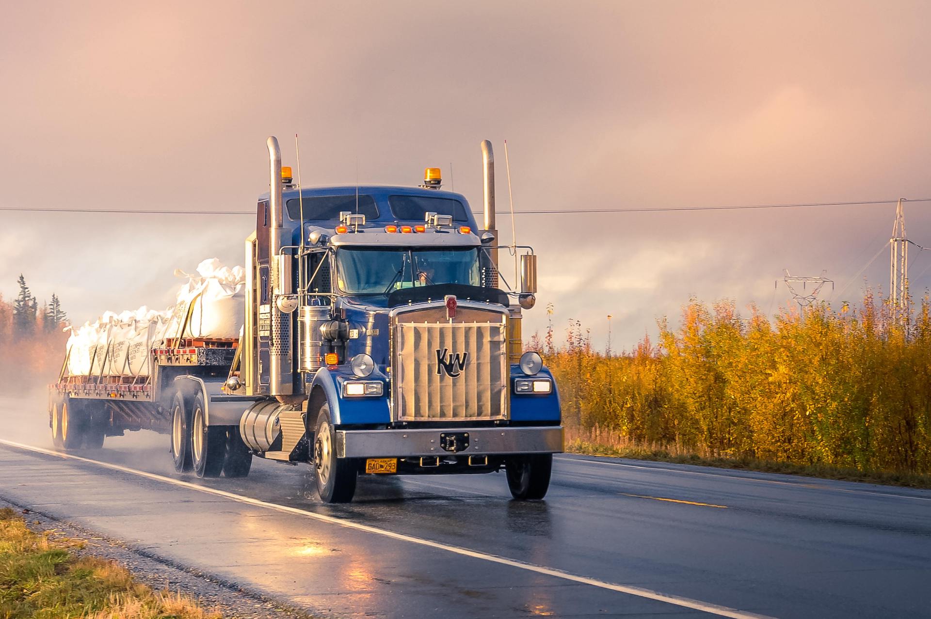 Flatbed semi truck driving on the freeway